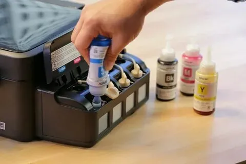 Filling printer ink tank to check how many pages can I print with one ink cartridge efficiently